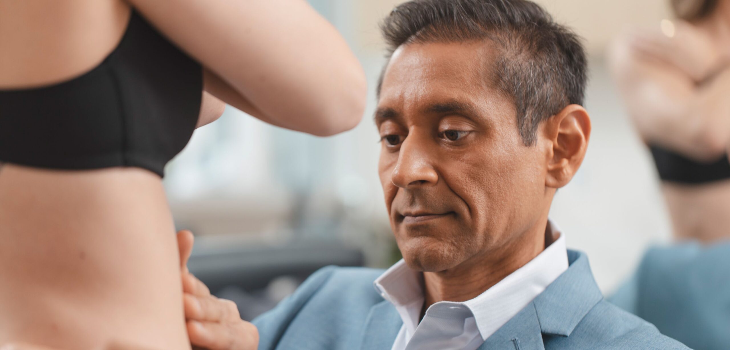 Dr. Savalia with a patient during a consultation