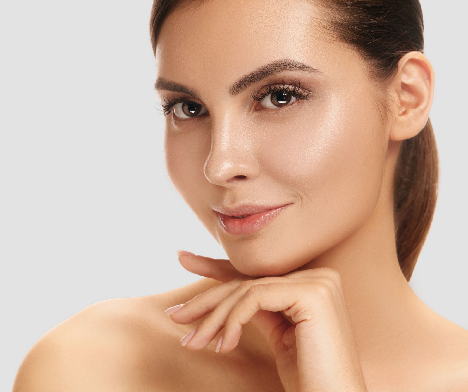 beautiful woman with hand under her chin