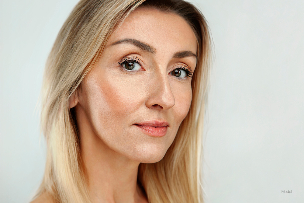 Mature woman with blonde hair